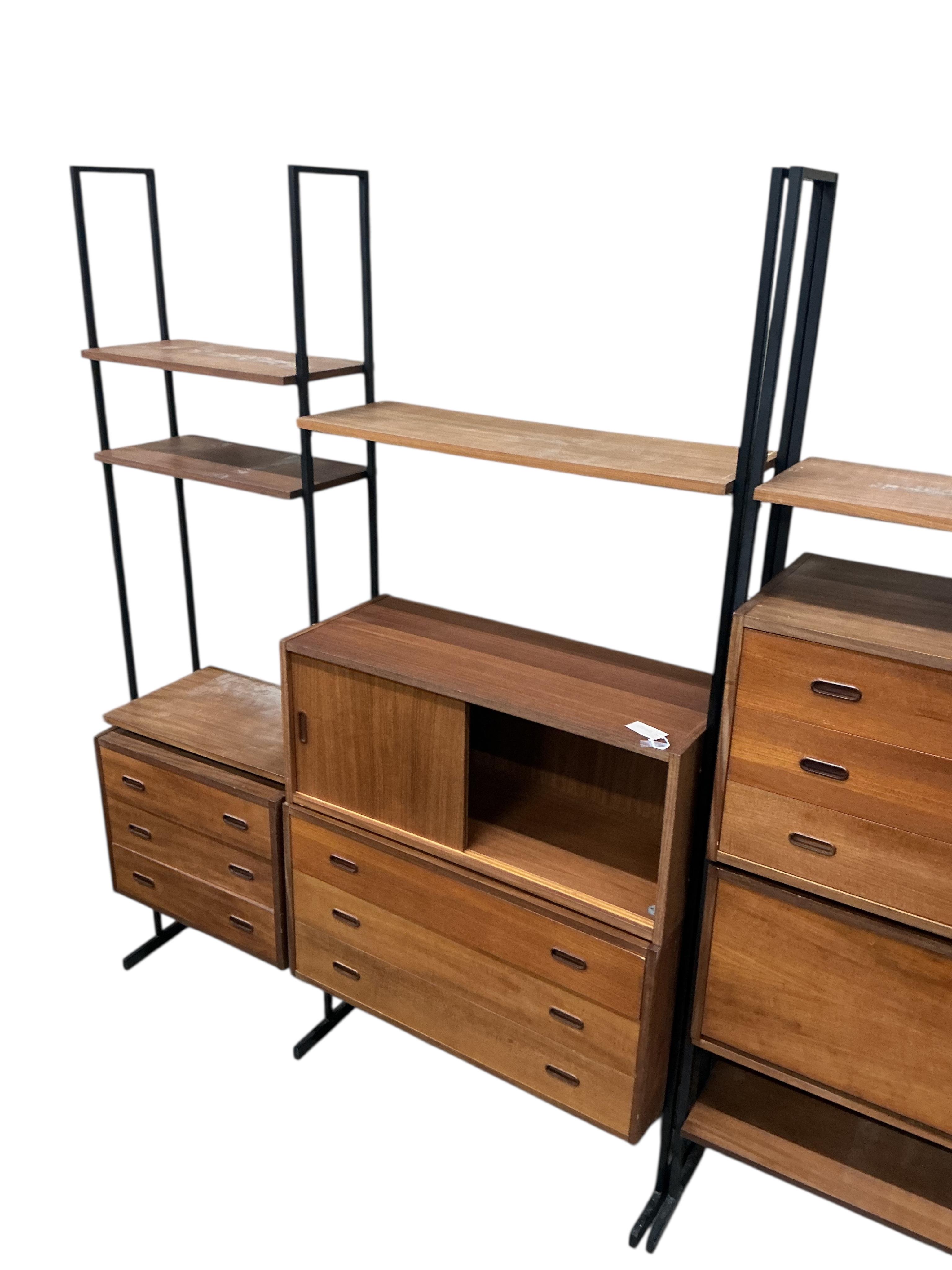 A mid century teak Ladderax type wall unit, width 341cm, depth 40cm, height 203cm